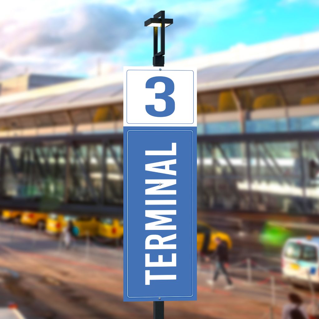 terminal wayfinding sign on a light pole